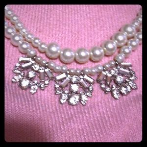 Beautiful pearl necklace with bling accessories